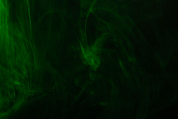 Green steam on a black background.