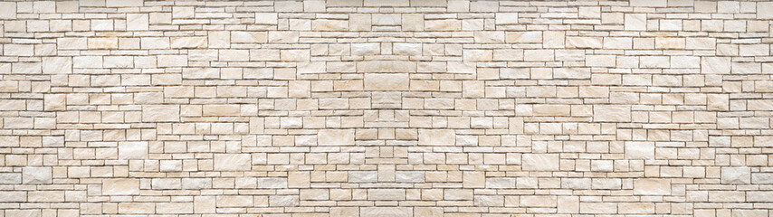 Wall Mural - Natural beige white stone brick wall texture background banner panoramic panorama