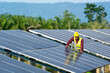 © visoot - Engineer working and checking at solar power station,Climate change and renewable energy,renewable energy friendly management systems concept.
