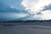Crepuscular Rays Over Sand Dunes
