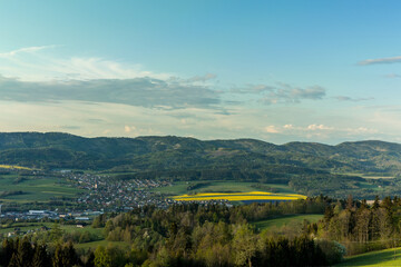 Wall Mural - Landscape with lots of clouds in the mountainous area of the Beskydy Mountains during a sunny afternoon.