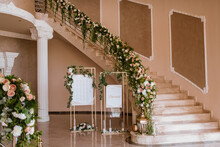 Beautiful Luxury Wedding Reception With Flowers. Stairs Decorated With Flowers
