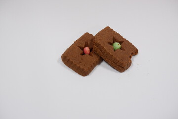 Two chocolate cookies on a white background (Top View)