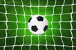 © ImageHit - A soccer ball in goal net