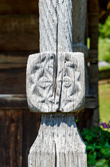 Wall Mural - Old traditional carved wooden pillar