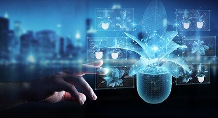 Fototapete - Man hand holding and touching holographic projection of a plant with digital analysis 3D rendering