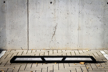 Concrete wall and parking place