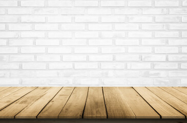 Empty wooden table top on white brick wall background, Design wood terrace white. Perspective for show space for your copy and branding. Can be used as product display montage. Vintage style concept.