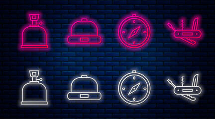 Poster - Set line Beanie hat, Compass, Camping gas stove and Swiss army knife. Glowing neon icon on brick wall. Vector.