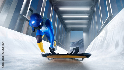 Dekoracja na wymiar  sport-szkieletowy-bobsleje-saneczkarstwo-sportowiec-zjezdza-saniami-po-lodowym-torze-zima