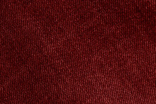 The Texture Of Red Jeans. Background Of Red Jeans. Red Denim