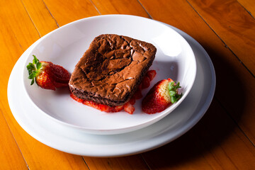 Wall Mural - Homemade chocolate brownies with strawberry