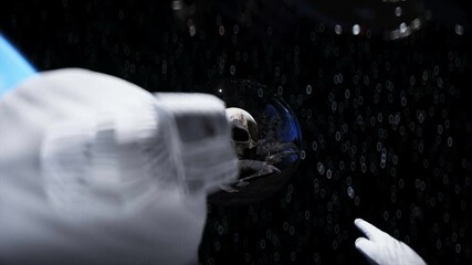 Wall Mural - astronaut and human skull in outer space in glass sphere. apocalypse concept. 3d rendering.