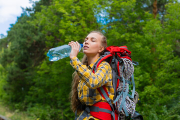 Close up photo of a female hiker in the forest.