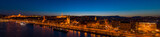 Fototapeta Na sufit - Aerial drone shot of St. Anne Parish church by Danube river at Budapest dusk city lights on