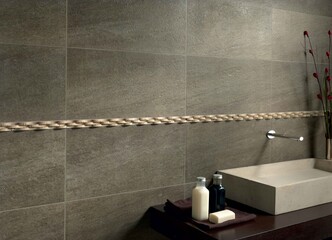 Wall Mural - Modern interior design of bathroom with grey stone tiles, luxurious background.