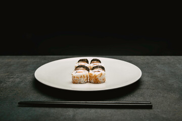 stock photography japanese sushi rice roll salmon and cheese presented on top of white plate