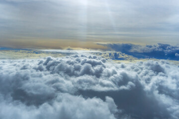 beautiful cloud on blue sky see from airplane window.