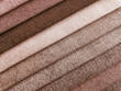 Close up detail of classic brown tones color fabric texture samples. interior material for curtain or drapery.