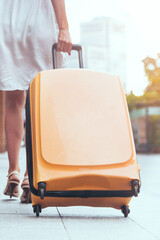  Girl traveler and suitcase