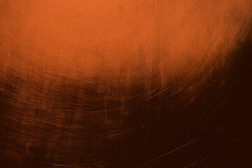 metallic grungy orange background with spotlight