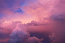 Clouds And The Sky In Bright Pink Blue And Blue Tones. Fabulous, Magical Sky. The Image Can Be Used To Decorate A Banner And A Postcard. Background.