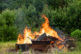 Fototapeta  - Campfire On Cottage Plot In Summer Outdoors.