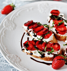 Sticker - Sandwich with strawberries. With soft cheese and balsamic vinegar. Soft focus.