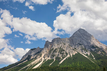 Wall Mural - mountain peak over blue sky