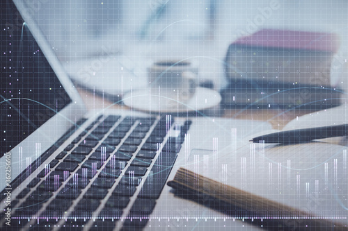 Cuadros en Lienzo Double exposure of financial chart drawing and desktop with coffee and items on table background