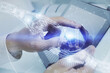 © peshkova - Multi exposure of man's hand holding and using a digital device and data theme drawing. Innovation concept.