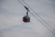 Cable Car Against The Clouds