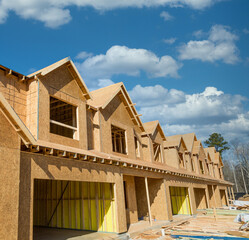 New townhouse construction of pine lumber and sheathing