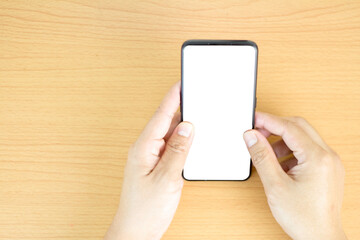 top view of hand holding white screen smartphone on hand