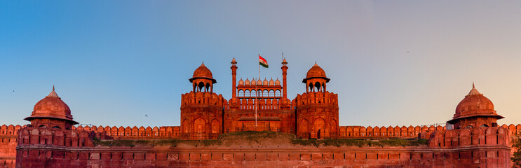 Red Fort is a historic fort UNESCO world Heritage Site at Delhi. On Independence day, the Prime Minister hoists Indian flag at main gate of fort & delivers nationally broadcast speech from its rampart