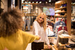 © BGStock72 - Two young women choosing clothes