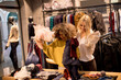 © BGStock72 - Two young women choosing winter clothes