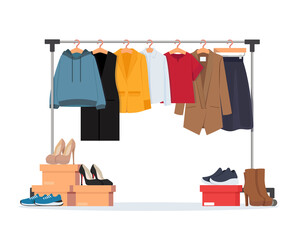 Wall Mural - Clothes hanger with different casual woman clothes, footwear. Wardrobe. Vector illustration in flat style.