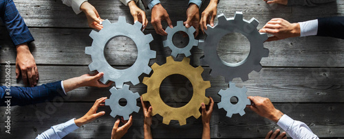 Cuadros en Lienzo Business people joining gears