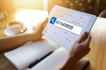 Wall Mural - Keywords. SEO, Search engine optimization and internet marketing concept on screen.