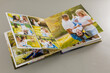 © Angelov - open photo book on a gray background