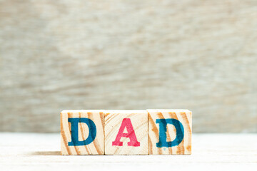 Canvas Print - Alphabet letter in word dad on wood background