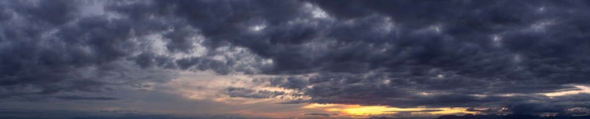 Wall Mural - Beautiful Panoramic View of Cloudscape during a colorful sunset or sunrise. Taken on the West Coast of British Columbia, Canada.