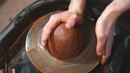 Wall Mural - Artisan working with clay at workshop. Pottery business concept. Ceramist at work, close up.