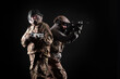 © Богдан Маліцький - army of america. two soldiers in military equipment with weapons stand on a black background, a special forces team