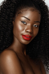 Wall Mural - beautiful model with curly hair and perfect skin .clouse up beauty fashion portrait of african ameri