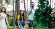 © My Ocean studio - Going to a hotel in the countryside. A half-length photo of a family, going to their hotel in the forest, father is leading by the hand their daughter, mother is walking behind.
