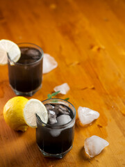 Wall Mural - summer ice lemonade with lemon, mint and charcoal