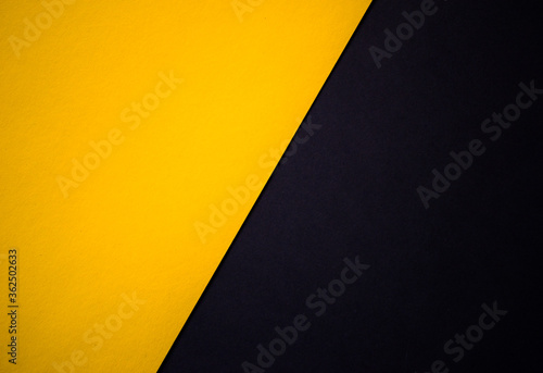 Photographie Yellow and black abstract diagonally divided background