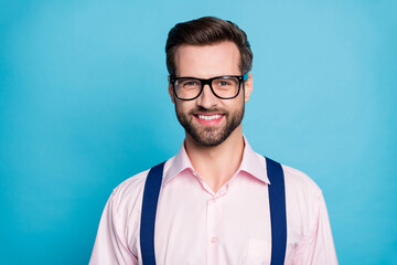 Poster - Closeup photo of handsome macho business man cool clothes guy toothy beaming smile eyesight care vision specs wear pink shirt suspenders isolated bright vivid blue color background